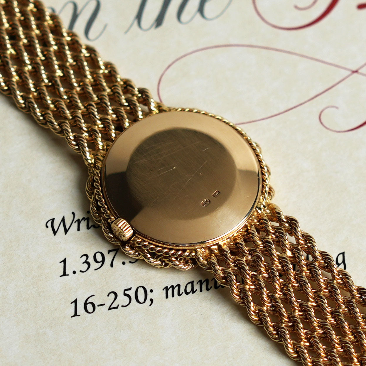 Patek Philippe Manual-wind Bracelet Watch, Coral dial, Yellow Gold