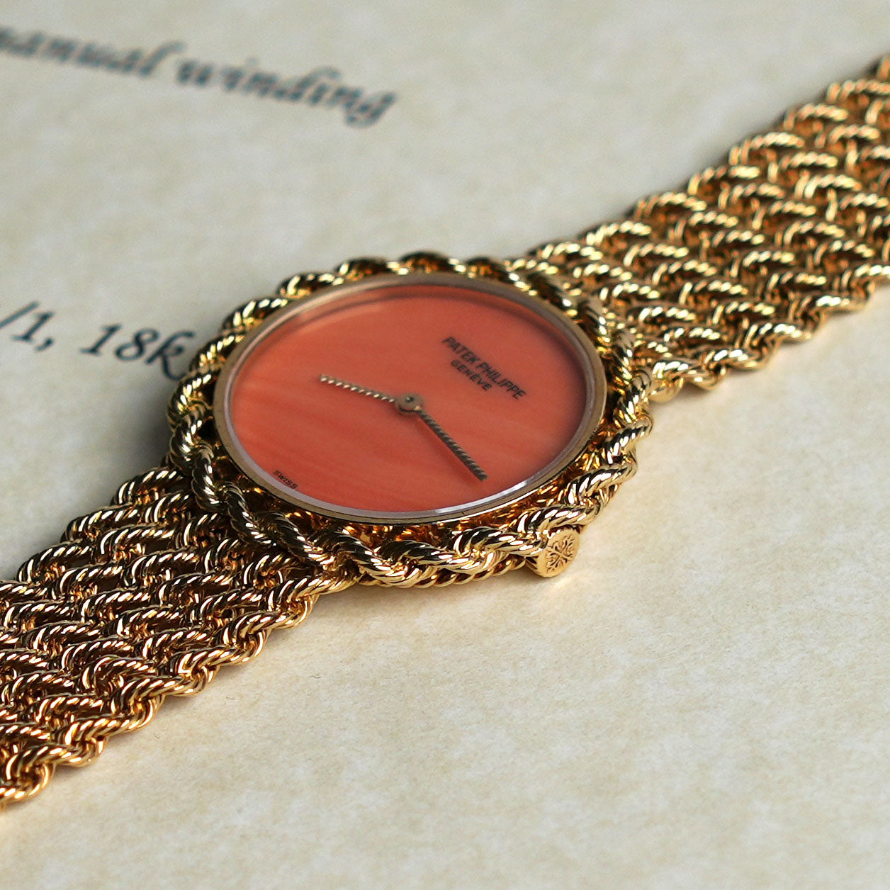Patek Philippe Manual-wind Bracelet Watch, Coral dial, Yellow Gold
