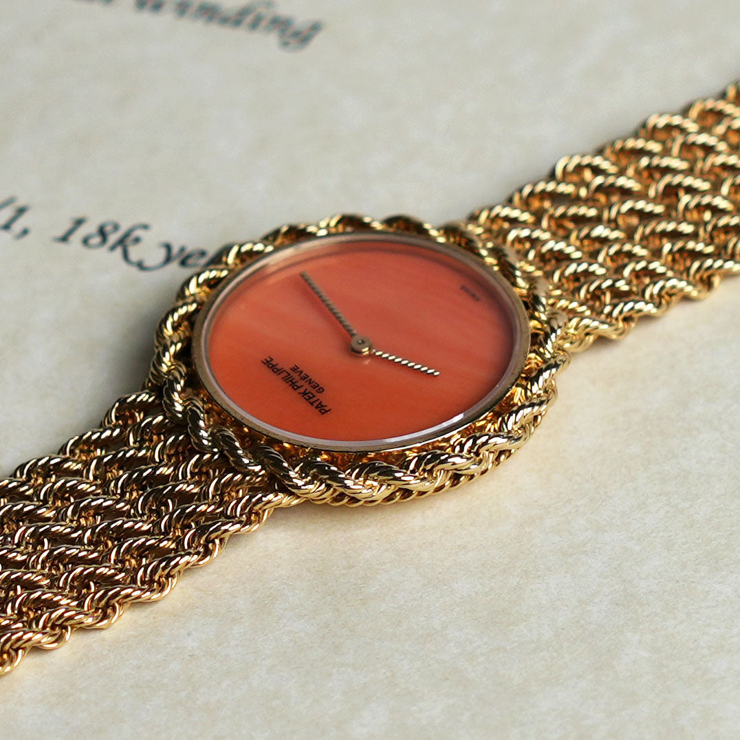 Patek Philippe Manual-wind Bracelet Watch, Coral dial, Yellow Gold