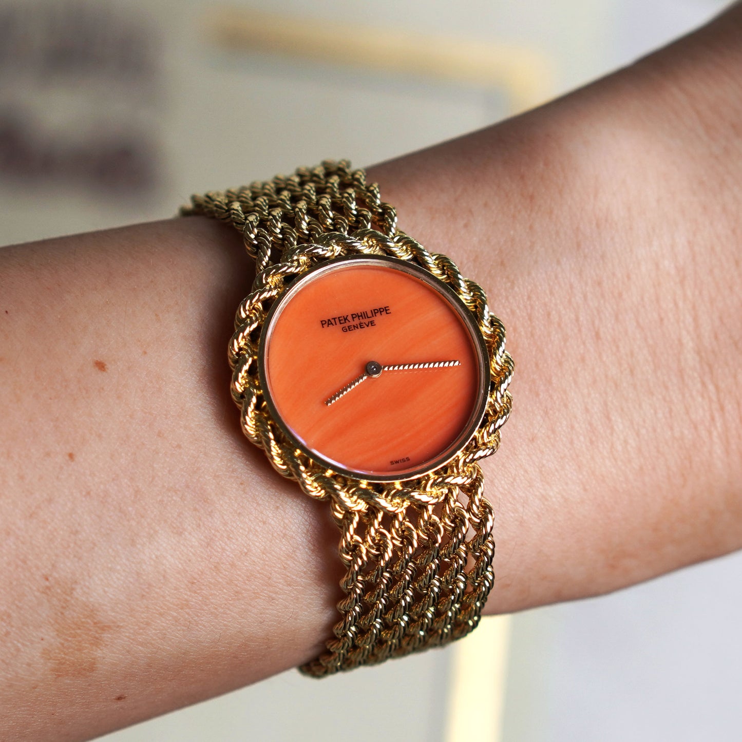 Patek Philippe Manual-wind Bracelet Watch, Coral dial, Yellow Gold