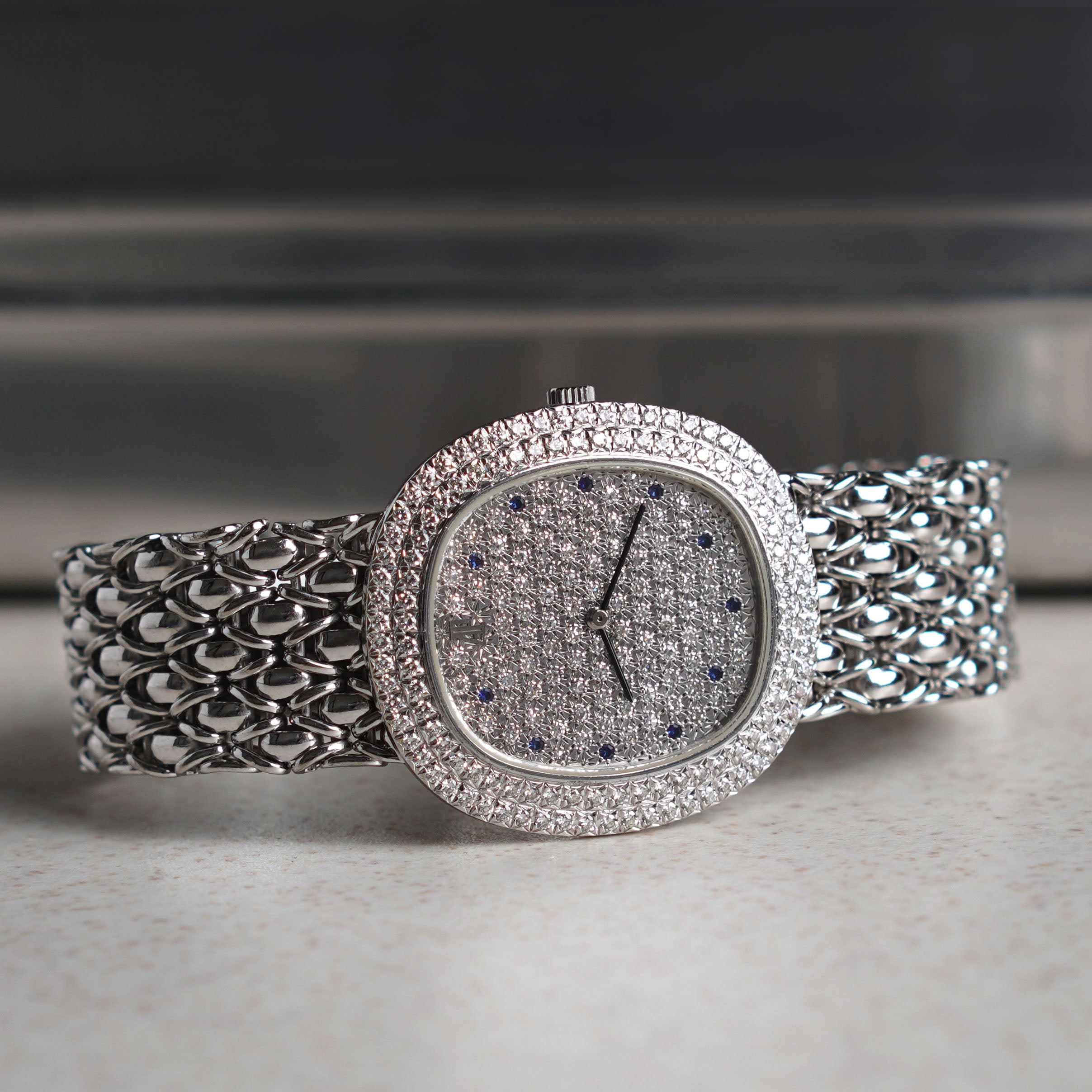 Audemars Piguet Oval-shaped Wristwatch, Diamond Bezel and Pavé Diamond Dial with Sapphires, White Gold