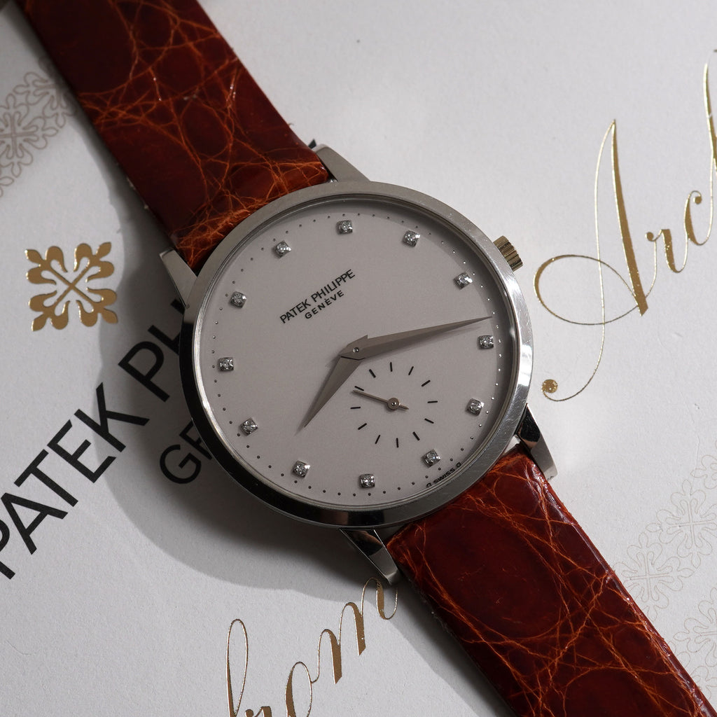 Patek Philippe Calatrava, Ivory-white dial with diamond markers, Ref. 3893, Platinum