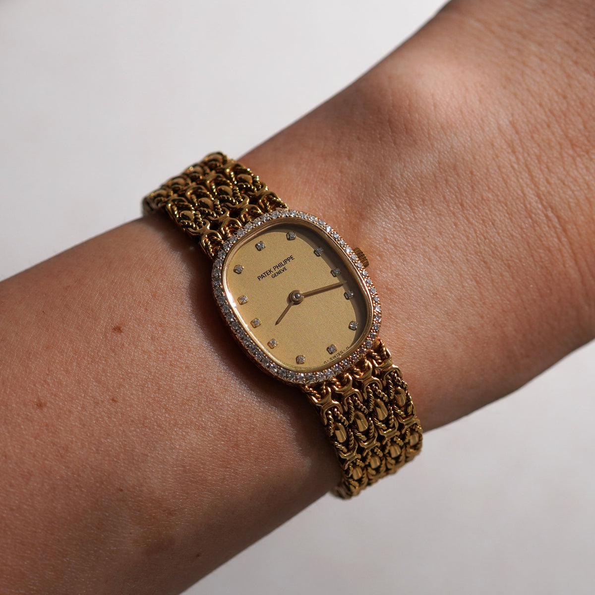 Patek Philippe Ladies Ellipse, Diamond bezel, Champagne dial, Ref. 4698/4, Yellow Gold