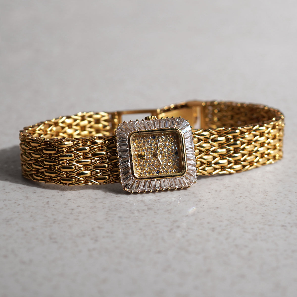 Audemars Piguet Bracelet Watch, Pavé diamond dial with Sapphire markers, Baguette diamond bezel, Yellow Gold