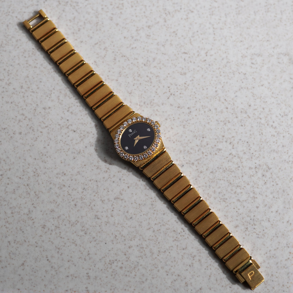 Piaget Polo, Ref. 8306 C701, Onyx dial with diamond markers, Yellow Gold