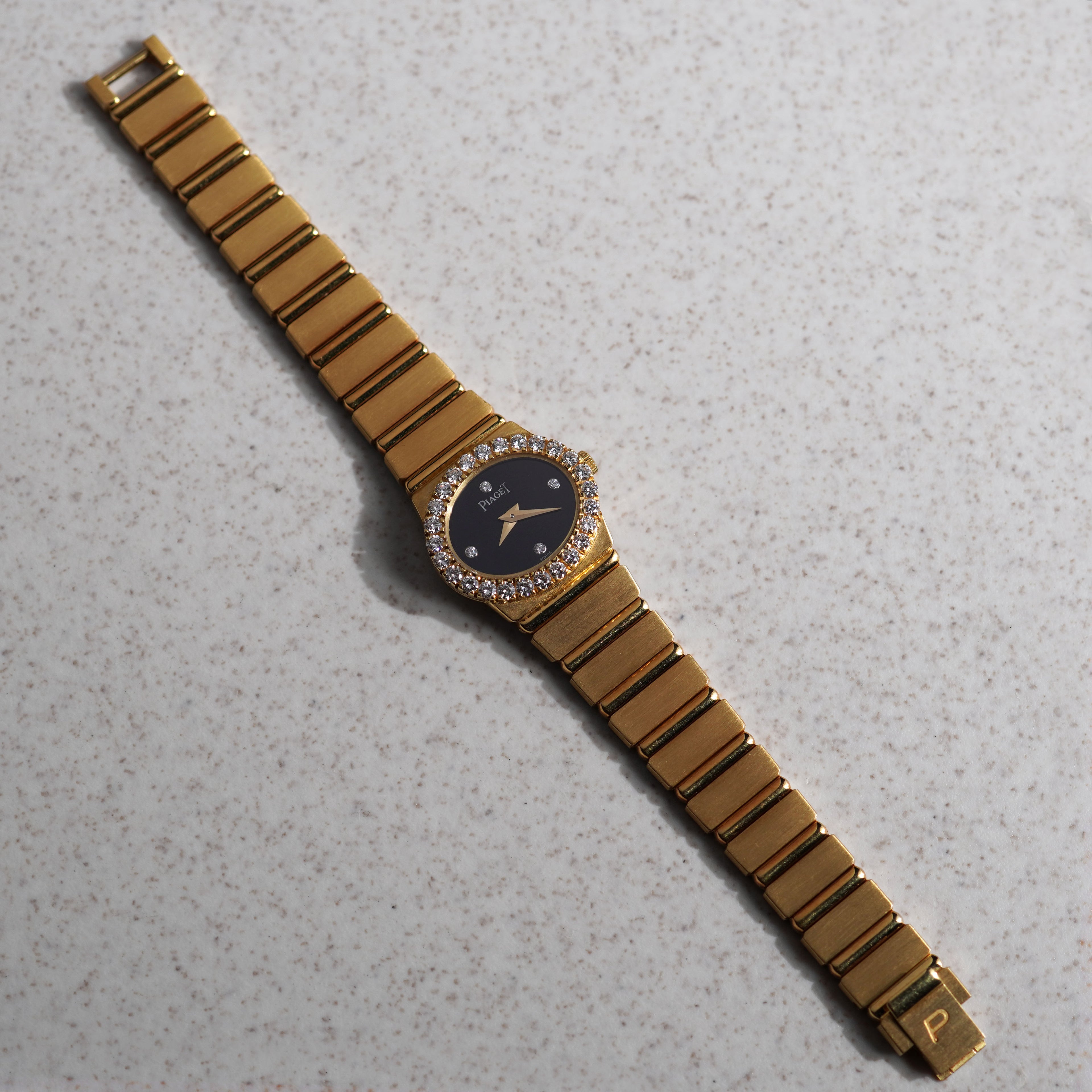 Piaget Polo, Ref. 8306 C701, Onyx dial with diamond markers, Yellow Gold