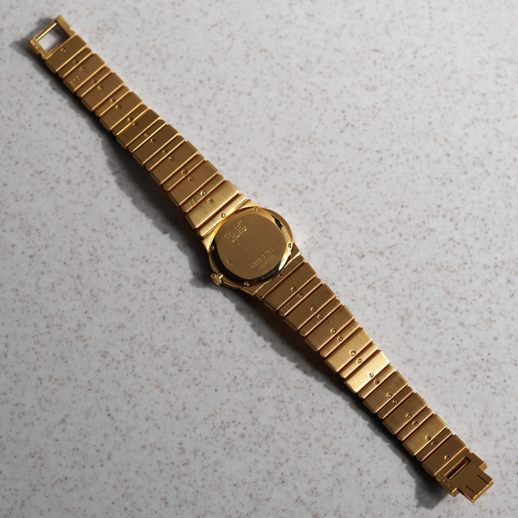 Piaget Polo, Ref. 8306 C701, Onyx dial with diamond markers, Yellow Gold