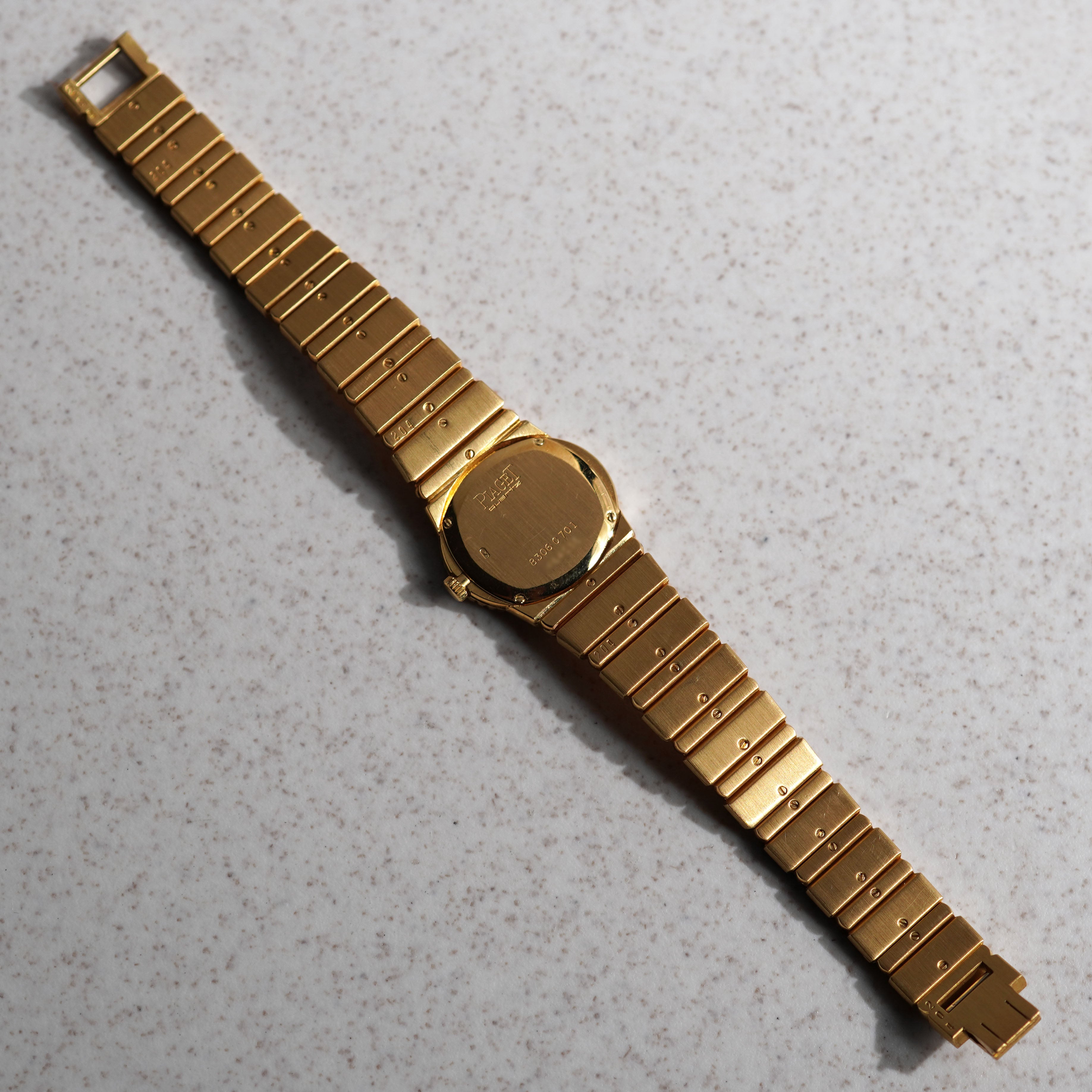 Piaget Polo, Ref. 8306 C701, Onyx dial with diamond markers, Yellow Gold