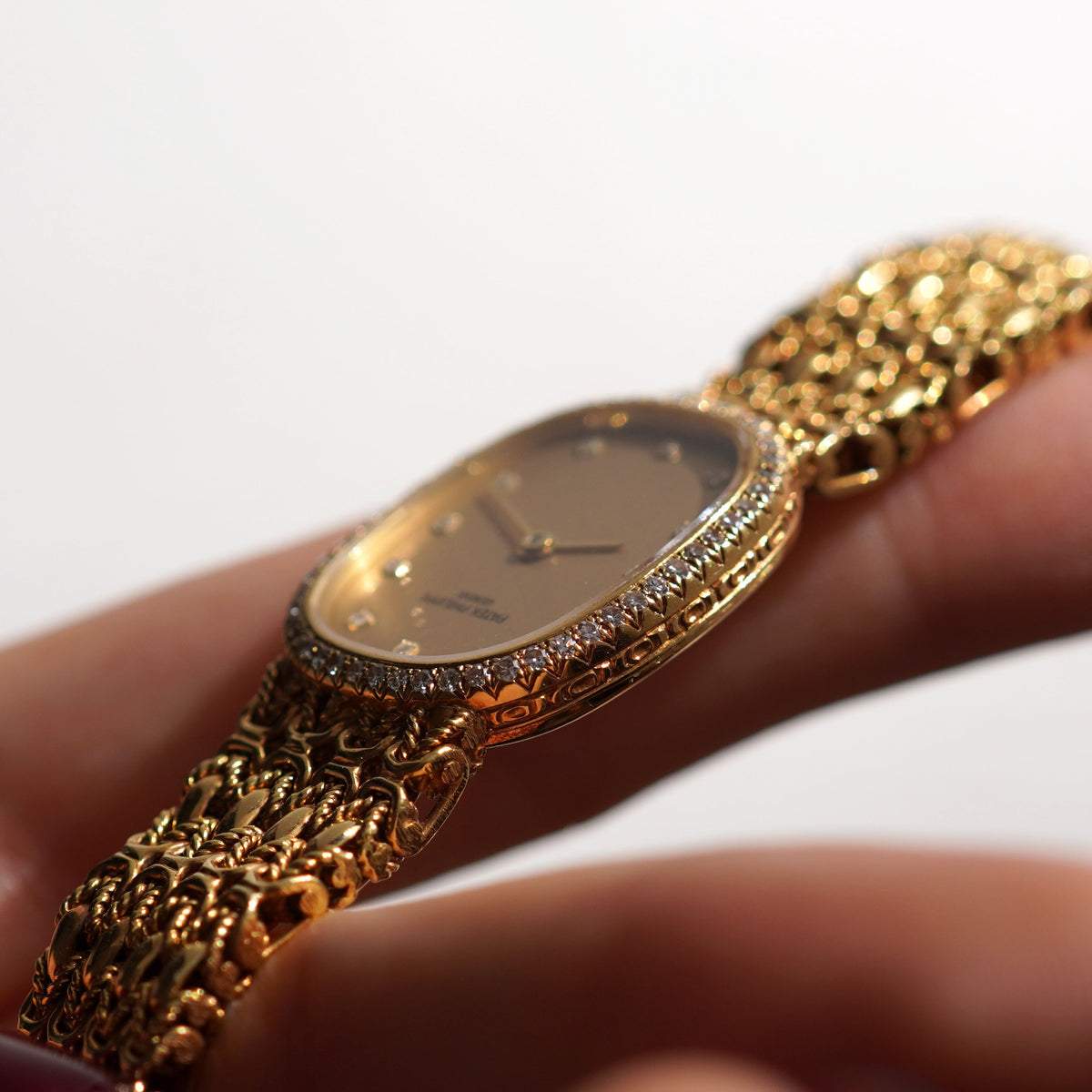 Patek Philippe Ladies Ellipse, Diamond bezel, Champagne dial, Ref. 4698/4, Yellow Gold