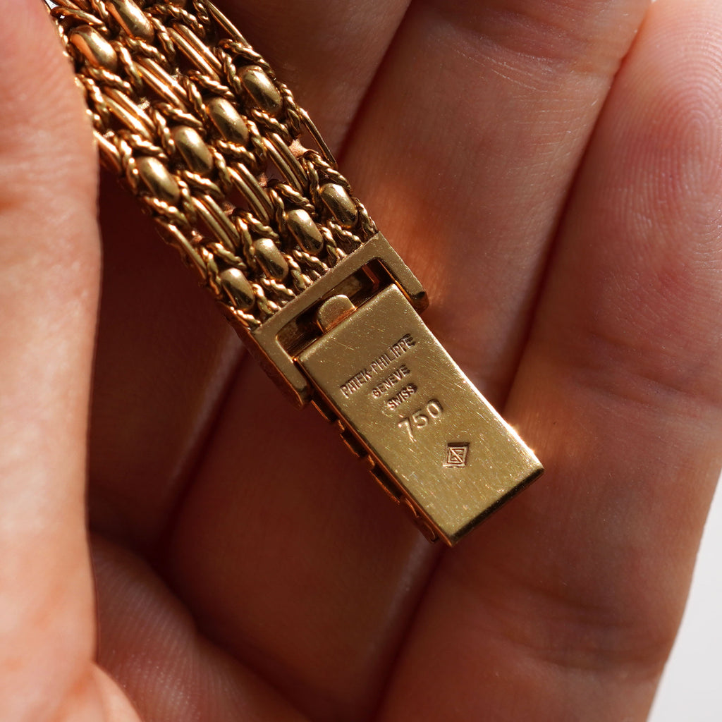 Patek Philippe Ladies Ellipse, Diamond bezel, Champagne dial, Ref. 4698/4, Yellow Gold