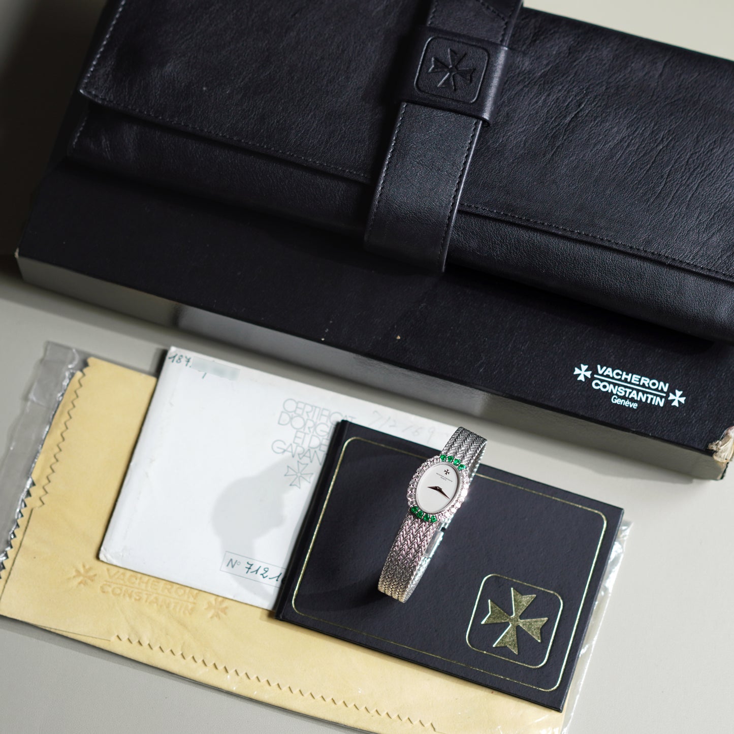 Vacheron Constantin Ladies Oval Bracelet Watch, Factory diamonds and emeralds, White Gold