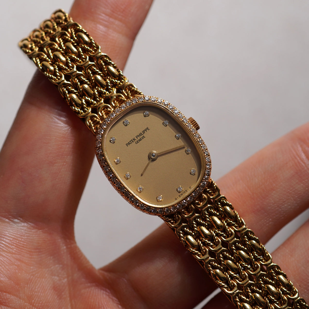 Patek Philippe Ladies Ellipse, Diamond bezel, Champagne dial, Ref. 4698/4, Yellow Gold