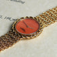 Patek Philippe Manual-wind Bracelet Watch, Coral dial, Yellow Gold