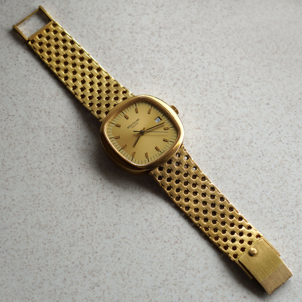 Patek Philippe Beta 21, Detachable "Swiss Cheese" Bracelet, Ref. 3597/2, Yellow Gold