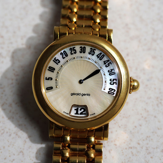 Gerald Genta Jumping Hour with Retrograde Minutes Bracelet Watch, Mother of Pearl Dial, Yellow Gold