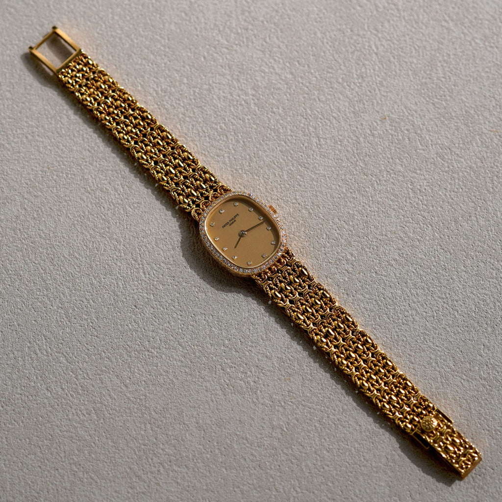 Patek Philippe Ladies Ellipse, Diamond bezel, Champagne dial, Ref. 4698/4, Yellow Gold
