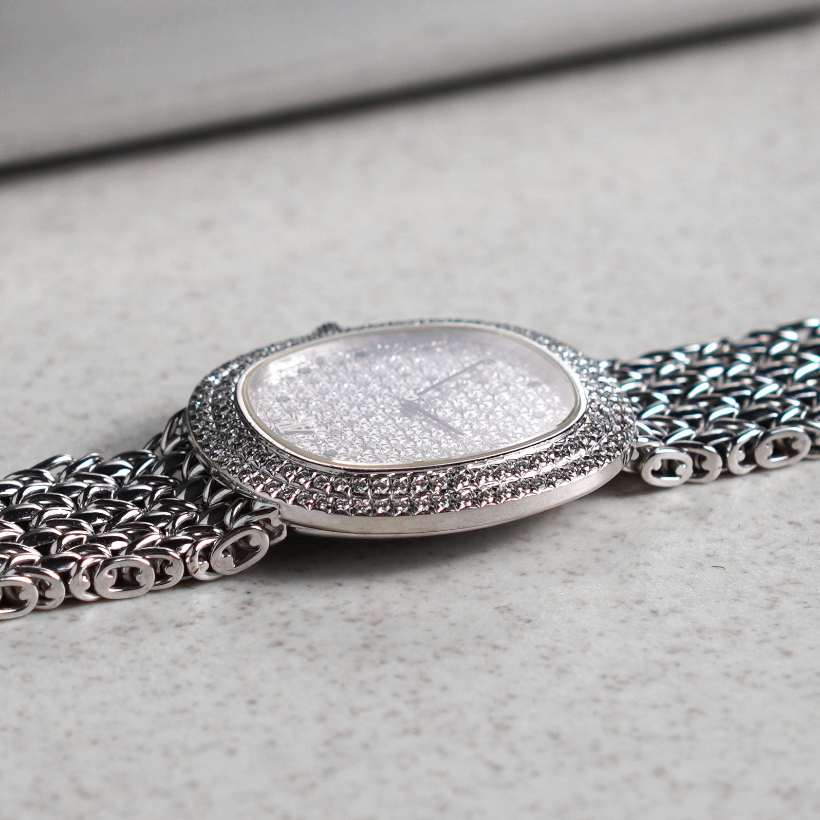 Audemars Piguet Oval-shaped Wristwatch, Diamond Bezel and Pavé Diamond Dial with Sapphires, White Gold