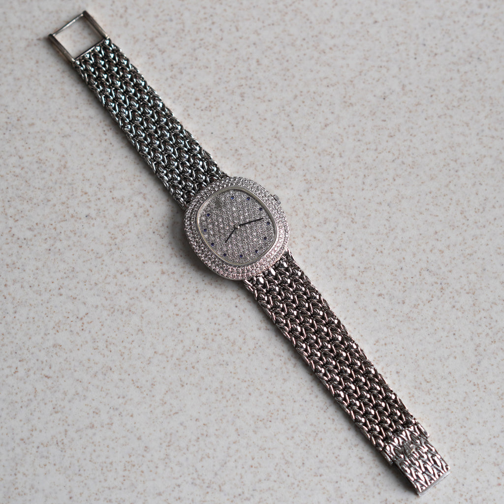 Audemars Piguet Oval-shaped Wristwatch, Diamond Bezel and Pavé Diamond Dial with Sapphires, White Gold